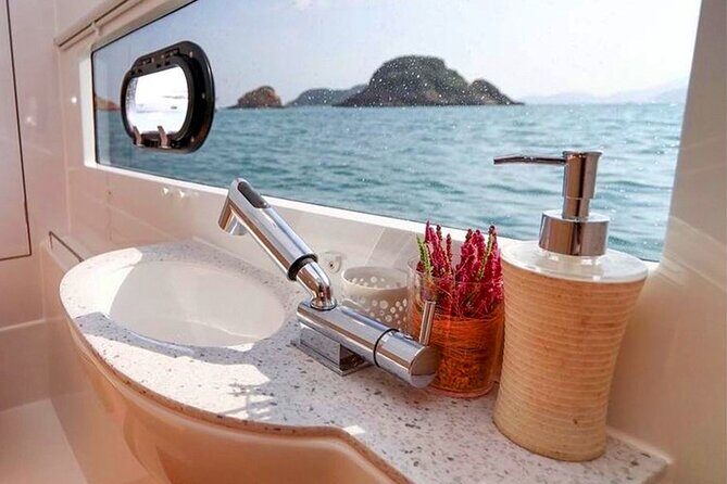 Private Luxury Catamaran Half Day Charter - The ride-and-rest rhythm: snack and top-shelf drinks after snorkeling